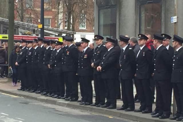 Firefighters lined up for the funeral