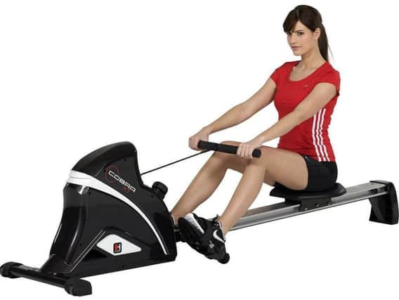Row back as far as possible and bring the cord into your chest rhythmically for a fuller lower-body workout