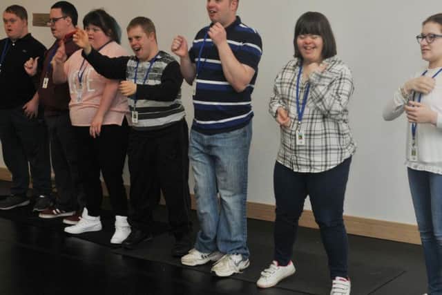 Students at One Vision, a media training centre for adults with additional needs, have been learning sign language for a new music video.