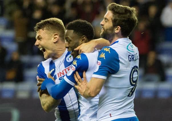 Wigan Athletic are four points away from securing promotion