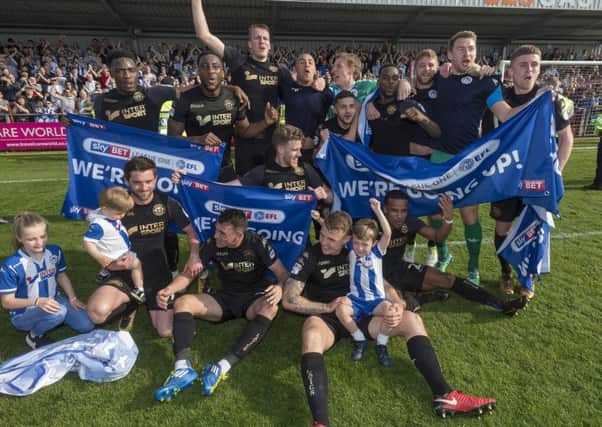 The Latics celebrations didn't take long to get under way after promotion was secured at Fleetwood