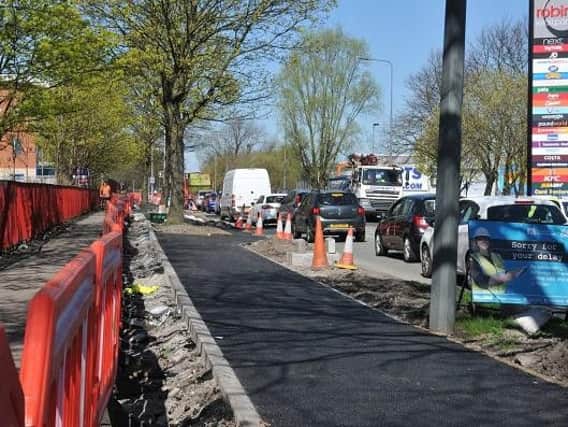 The new cycle lane under construction