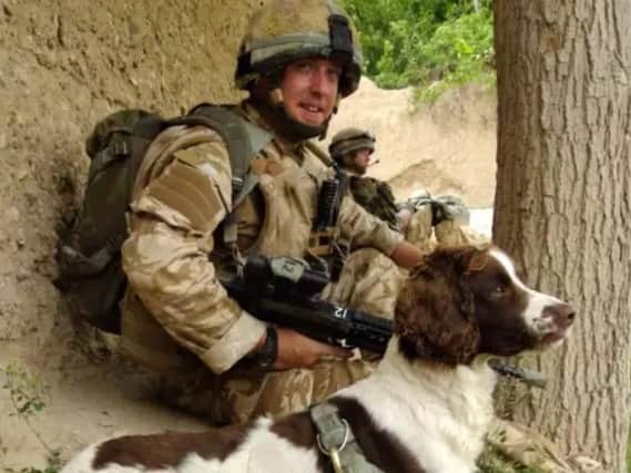 Lee Edwards, who served with the Royal Veterinary Corps, and his dog Molly