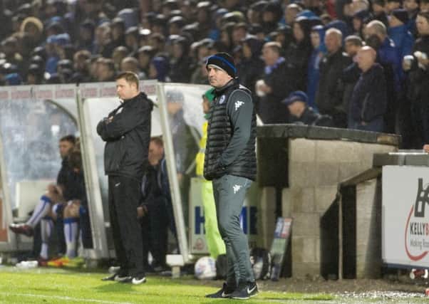 Paul Cook in the rain at Bristol Rovers