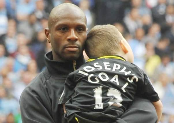 Emmerson Boyce with mascot Joseph at the 2013 FA Cup final