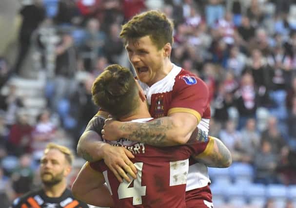 John Bateman congratulates Oliver Gildart, two players who have been linked with the NRL
