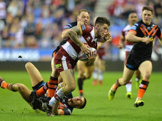 Oliver Gildart goes over for one of his two tries against Castleford last Friday