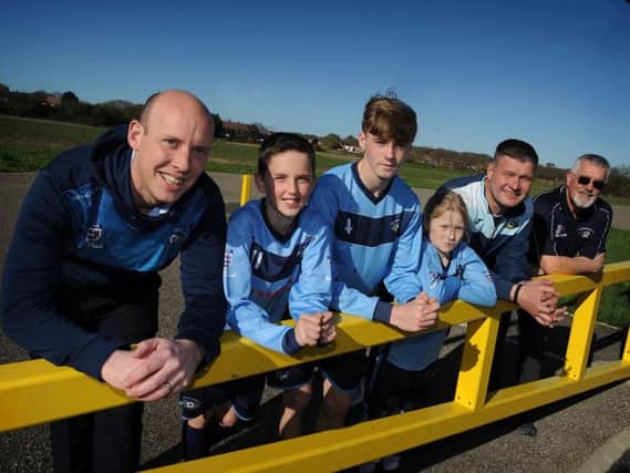 Waiting for the barrier to be raised on the project are, from left to right, Lee and Charlie Boyle, Alex, Lauren and Phil Priestley and Phil Keane