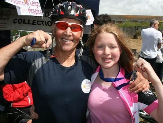 Dave Morris and Emma Coates after finishing the 2014 hospice ride