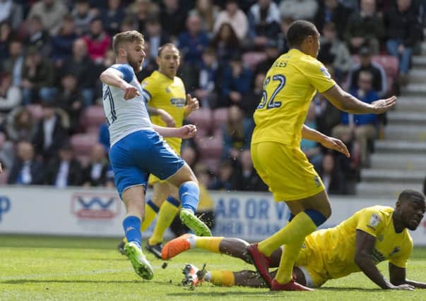Michael Jacobs scores against Wimbledon
