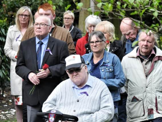 Wiganers gathered to remember those who died at work