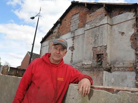 Mark Thompson, owner of Alpha Hire, said that the demolition is destroying his building