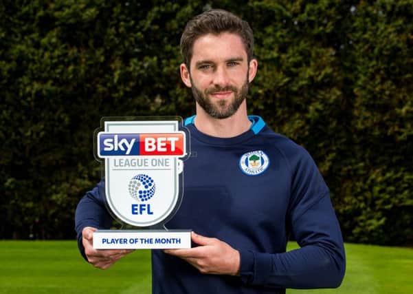 Will Grigg with his award