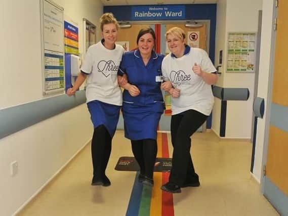 Staff from the Rainbow Ward prepare for their run