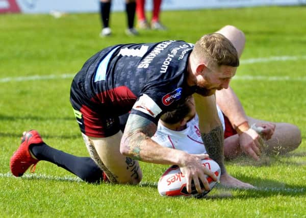 Sam Tomkins crossed for a try at Hull KR