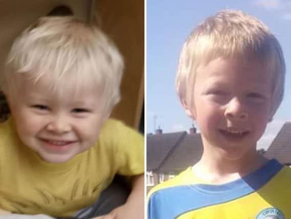 Two-year-old Casper Platt-May (left) and six-year-old Corey Platt-May