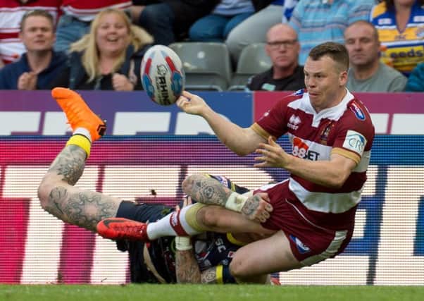 Liam Marshall releases the ball for George Williams' try at the Magic Weekend