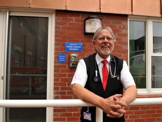 Dr Nayyar Naqvi outside the new cath lab extension at Wigan Infirmary