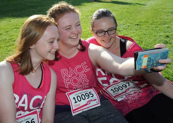 Wigan Race for Life at Haigh Woodland Park - Jessica, Claire and Alison Porter capture the moment