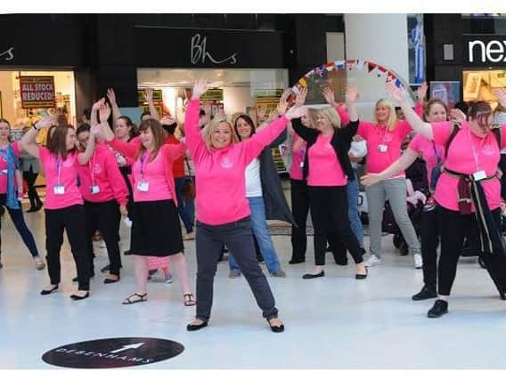 A previous Breast Awareness Month flashmob in the Grand Arcade