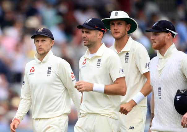 Englandcaptain Joe Root walks off with his team-mates at Lord's